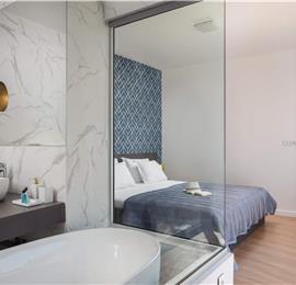 Luxury Beachfront Villa with Heated Infinity Pool near Trogir, Sleeps 8